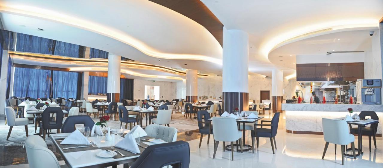 Royal M Al Aqah Beach Resort By Gewan Esterno foto The restaurant