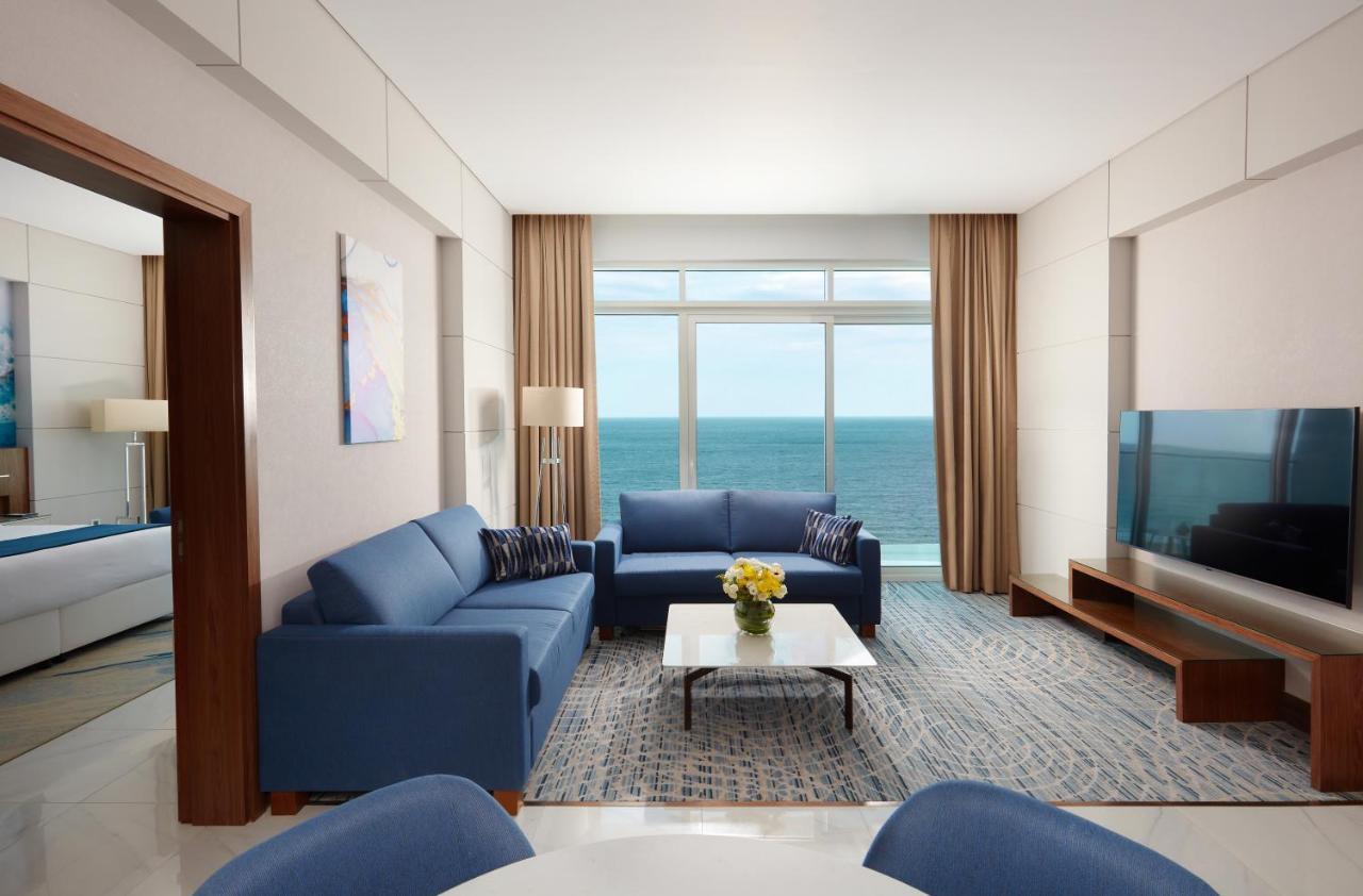 Royal M Al Aqah Beach Resort By Gewan Esterno foto A living room at the hotel