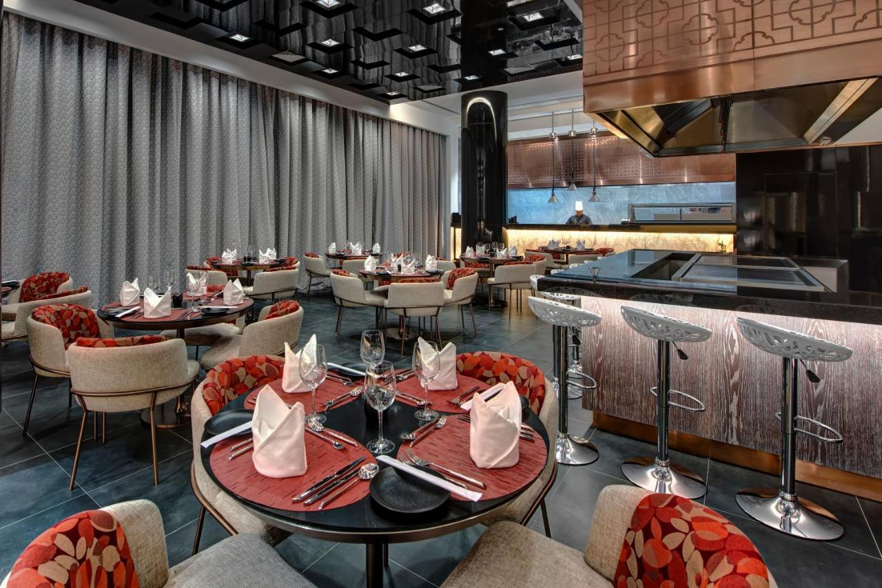 Royal M Al Aqah Beach Resort By Gewan Esterno foto The interior of the restaurant