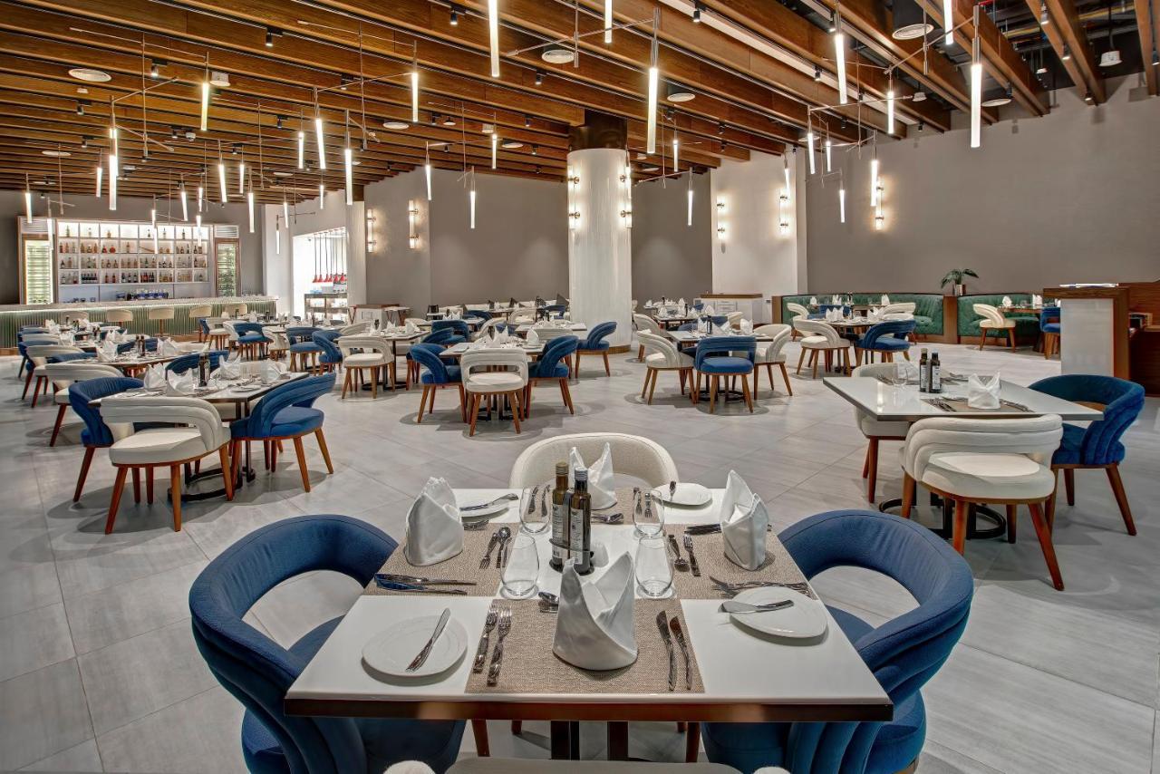 Royal M Al Aqah Beach Resort By Gewan Esterno foto The restaurant