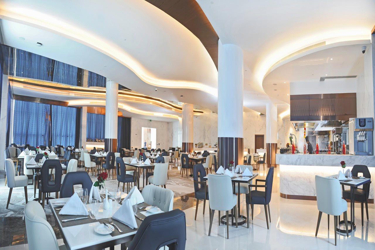 Royal M Al Aqah Beach Resort By Gewan Esterno foto The restaurant